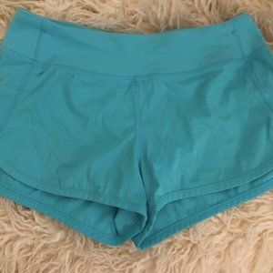 Turquoise and Green Ivivva Speedy Shorts